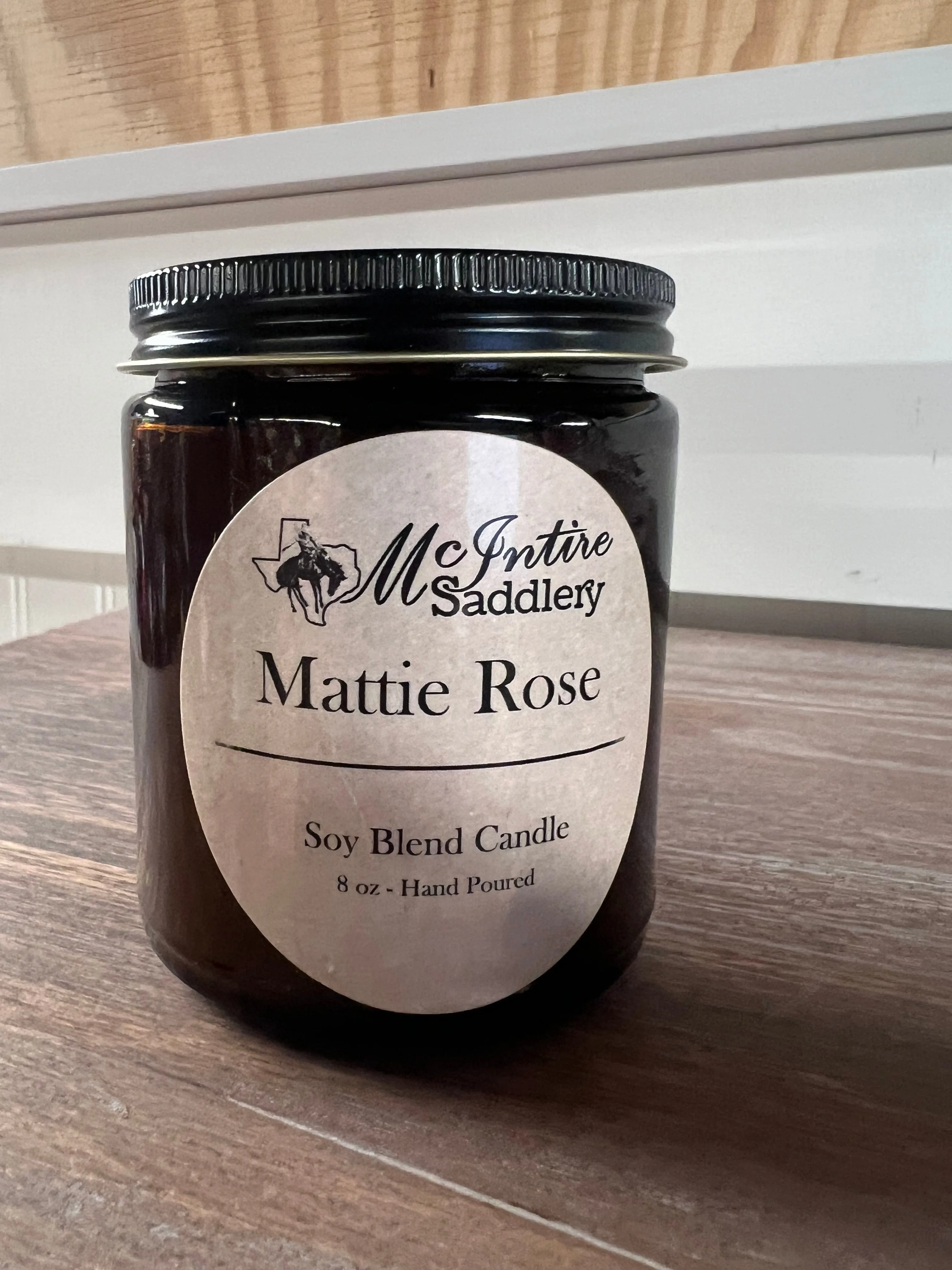 MCINTIRE SADDLERY 8OZ_CANDLE -