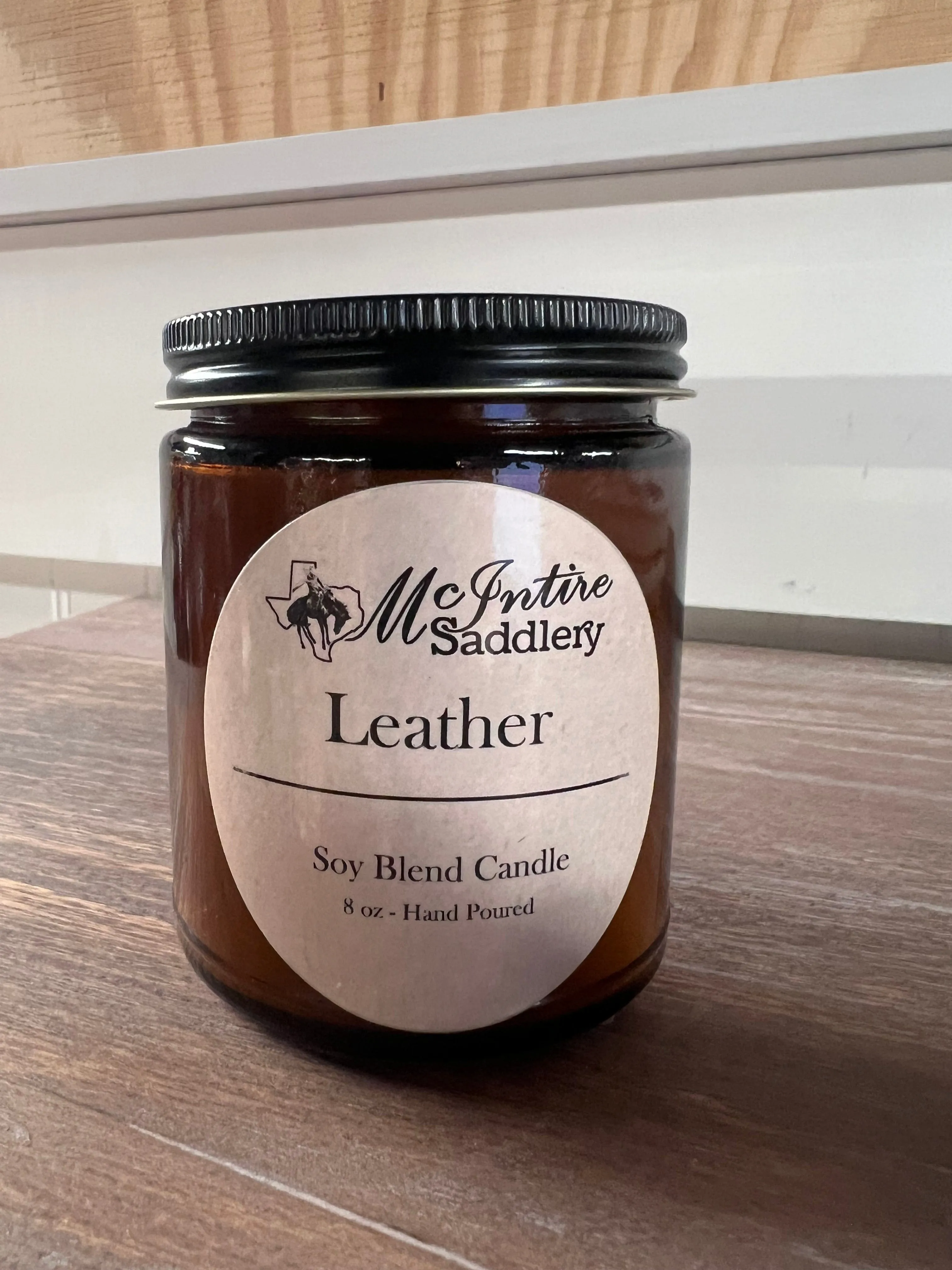 MCINTIRE SADDLERY 8OZ_CANDLE -