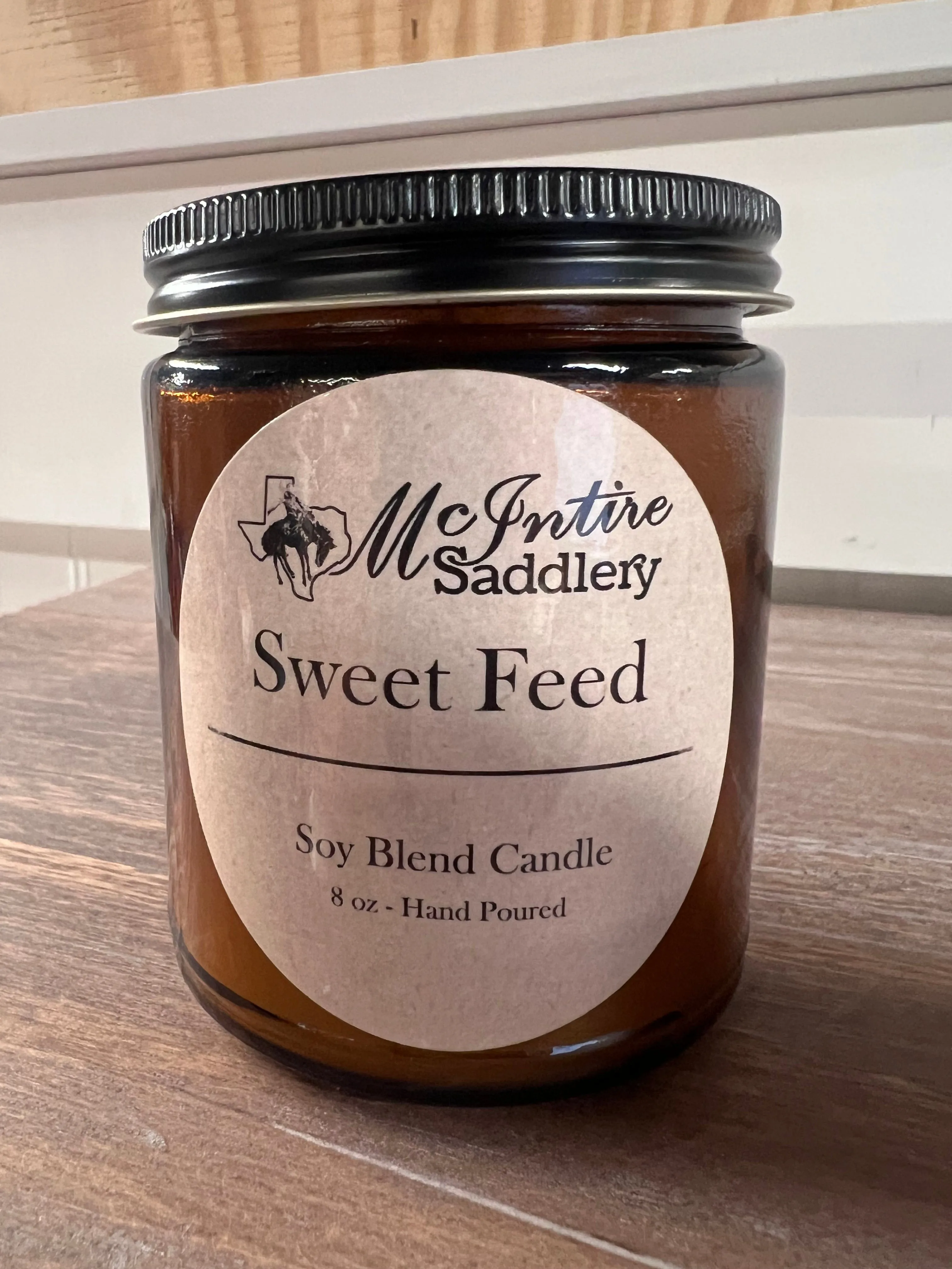 MCINTIRE SADDLERY 8OZ_CANDLE -