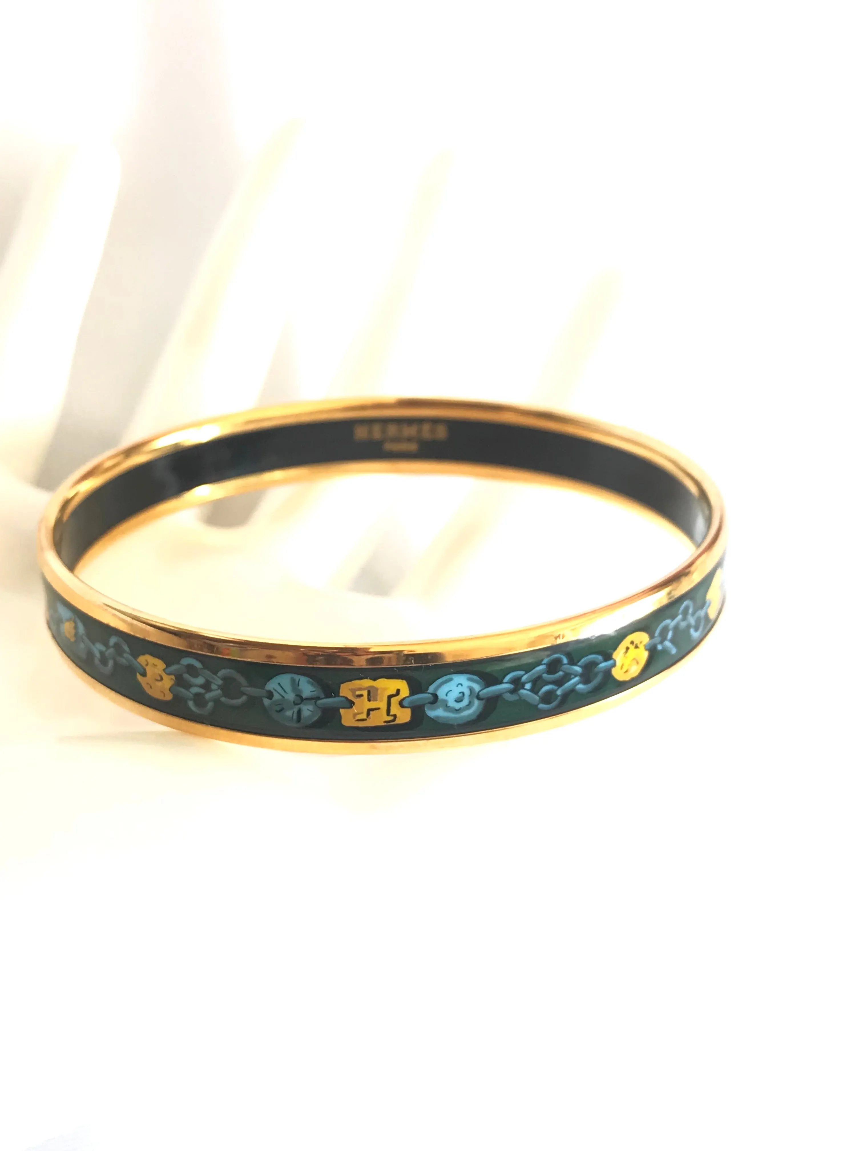 Ves. Vintage Hermes cloisonne enamel bangle with green, yellow, and blue. Charm and chain design. 050320r7