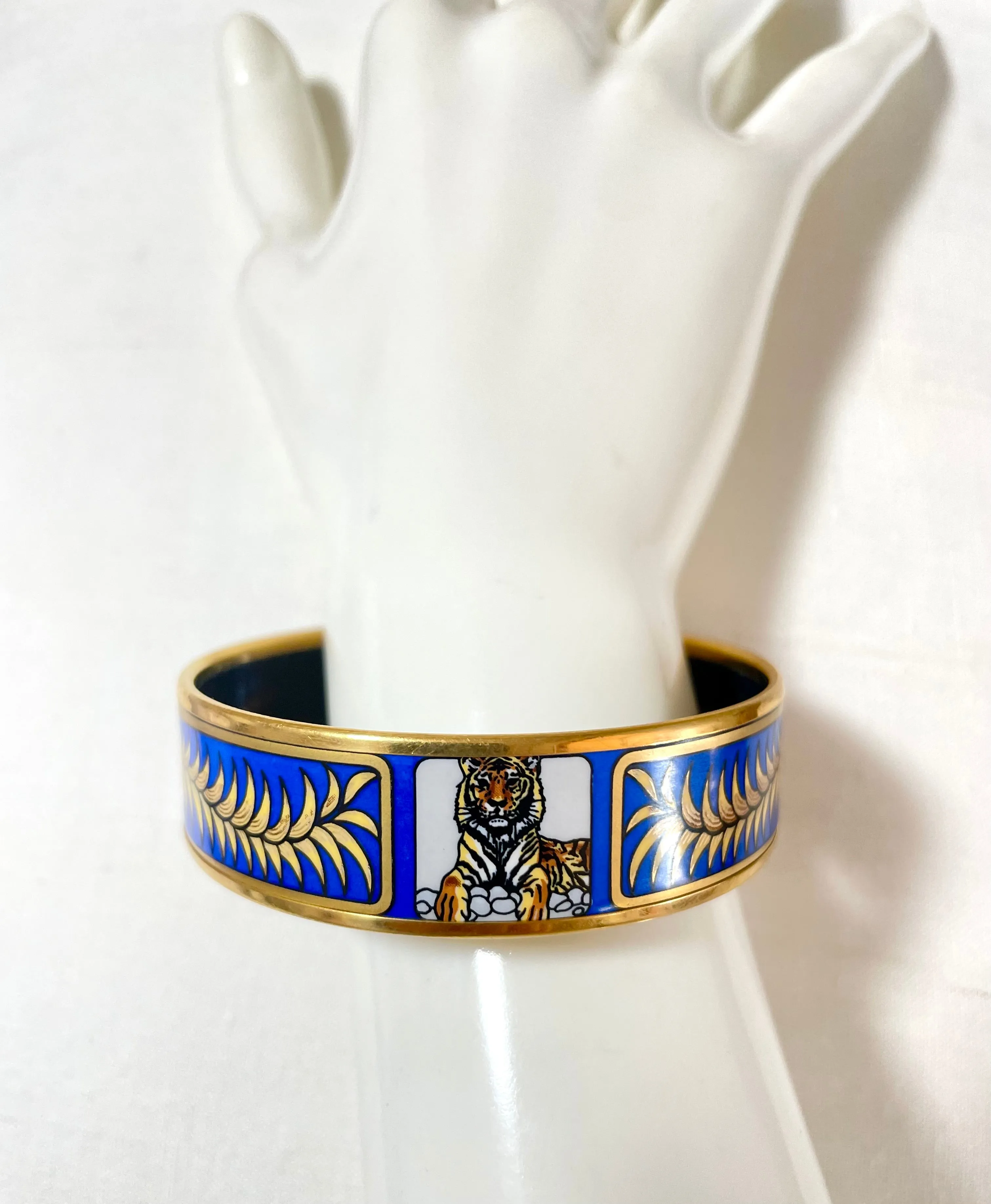 Vintage Hermes blue cloisonne enamel golden thick bangle, bracelet with tiger and leaves design in blue and gold. 070114ac3