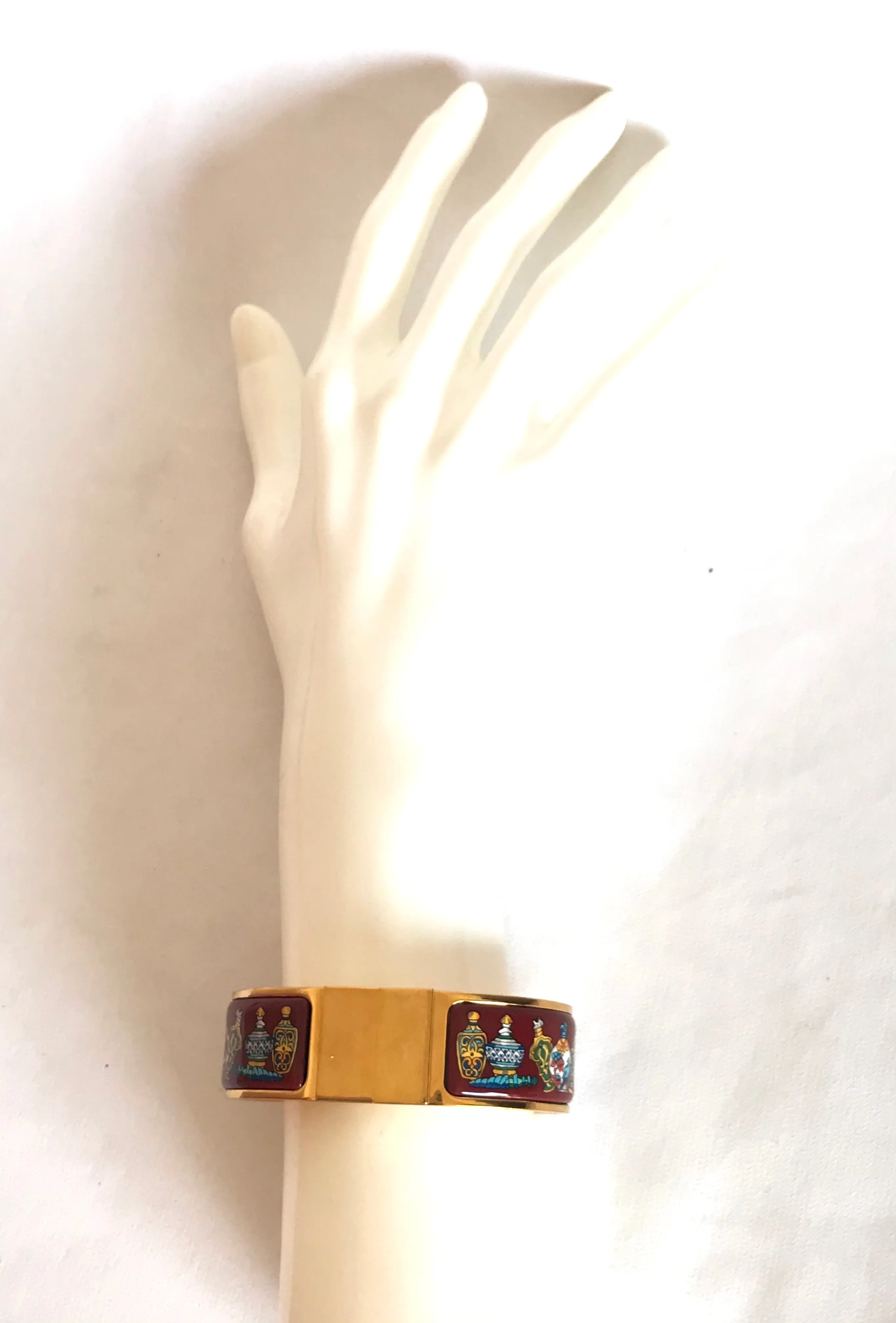 Vintage Hermes cloisonne enamel golden click and clack Flacon bangle with wine red and colorful perfume bottle design. Great gift idea. 050406r8