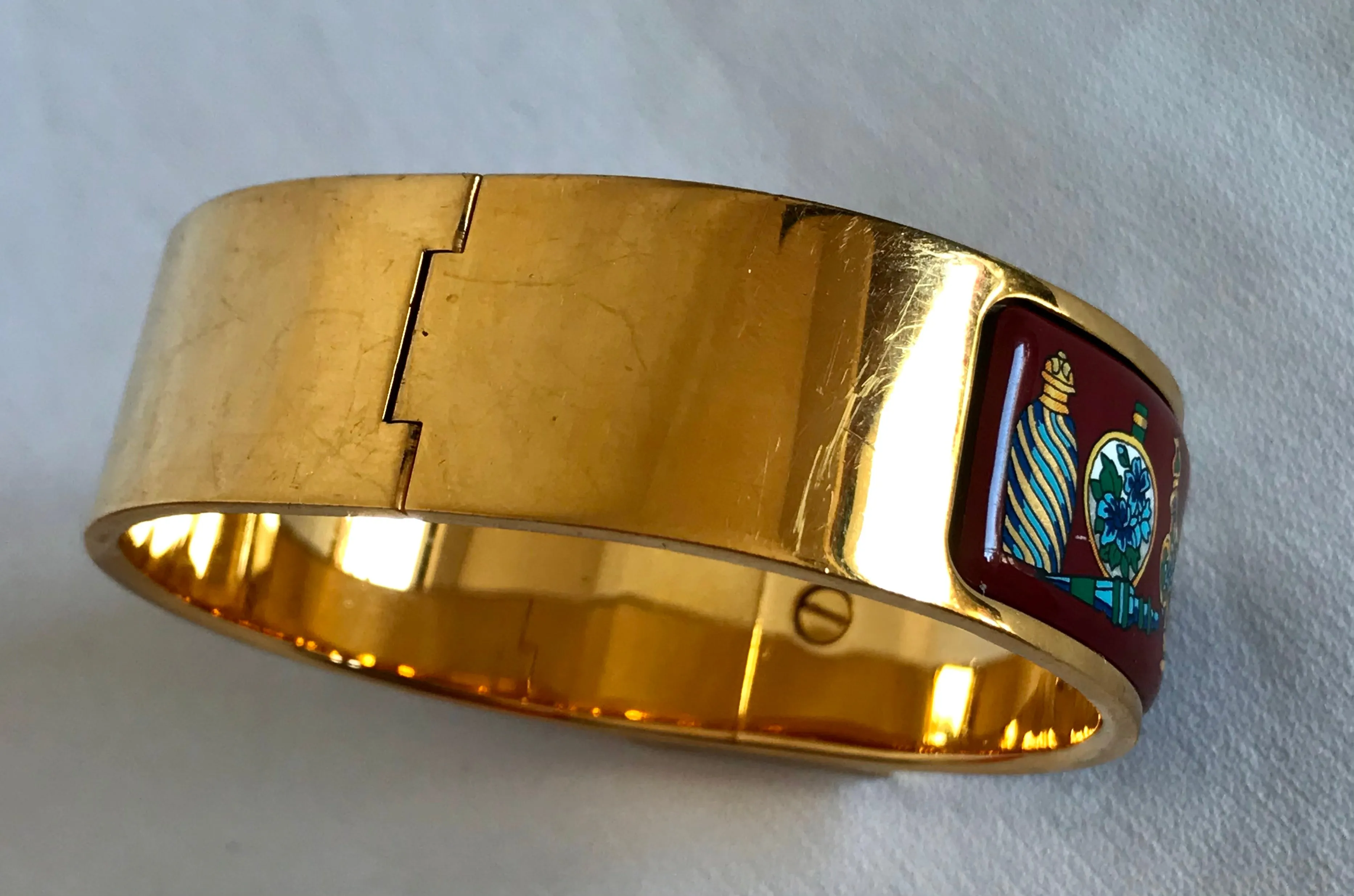 Vintage Hermes cloisonne enamel golden click and clack Flacon bangle with wine red and colorful perfume bottle design. Great gift idea. 050406r8