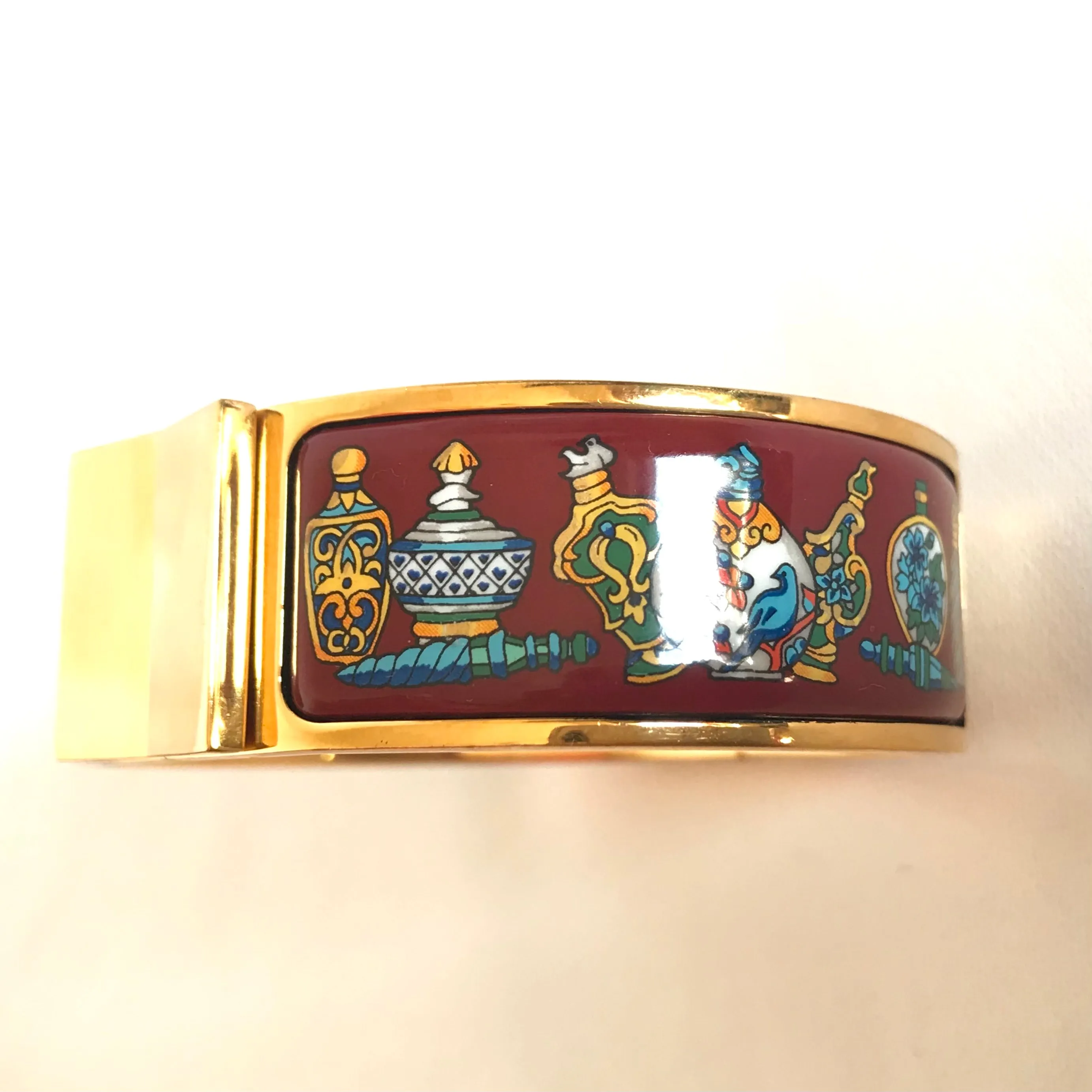 Vintage Hermes cloisonne enamel golden click and clack Flacon bangle with wine red and colorful perfume bottle design. Great gift idea. 050406r8