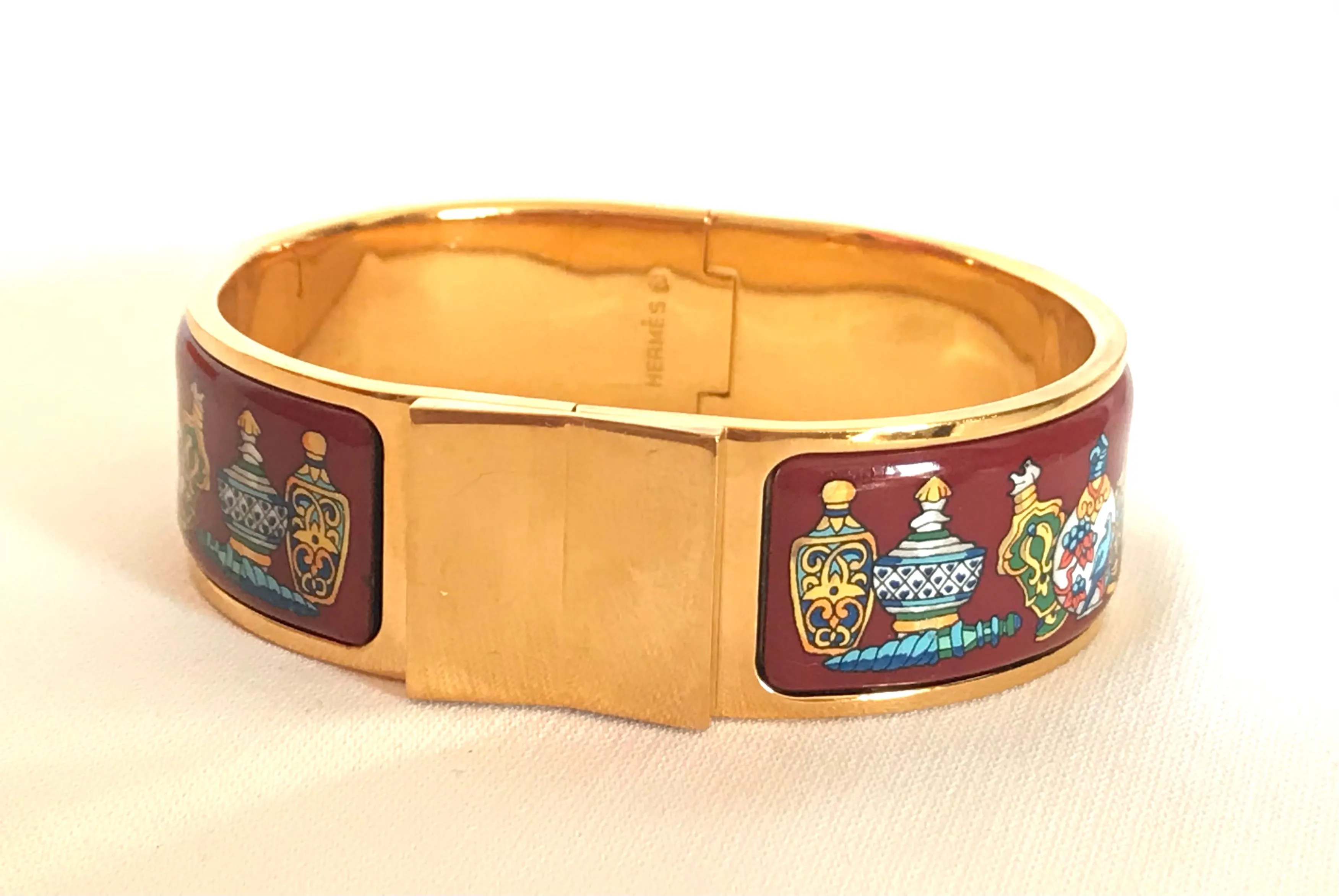 Vintage Hermes cloisonne enamel golden click and clack Flacon bangle with wine red and colorful perfume bottle design. Great gift idea. 050406r8