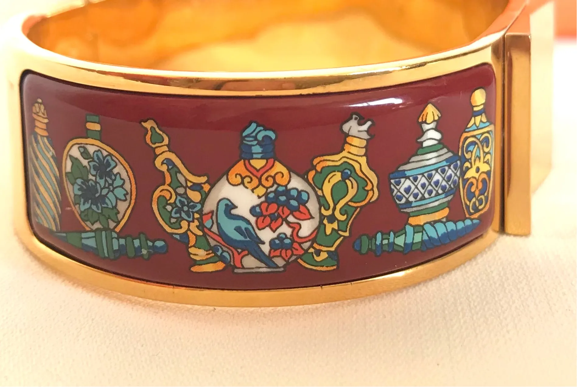 Vintage Hermes cloisonne enamel golden click and clack Flacon bangle with wine red and colorful perfume bottle design. Great gift idea. 050406r8